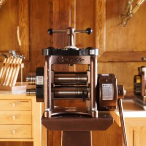 Durston agile elite rolling mill in front of durston goldsmith bench and hammer set